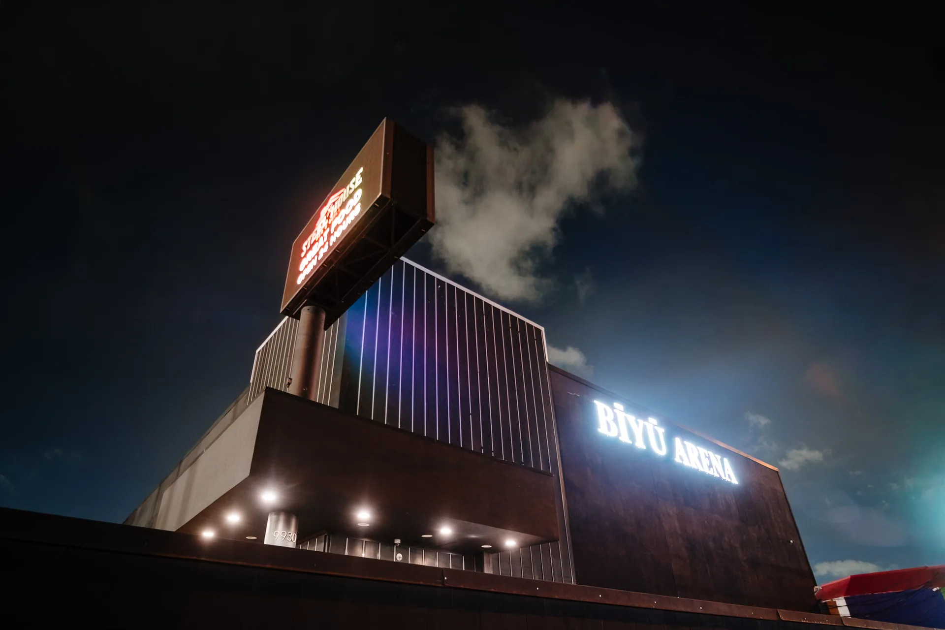 BIYU Arena exterior at 9930 North Fwy, Houston at night